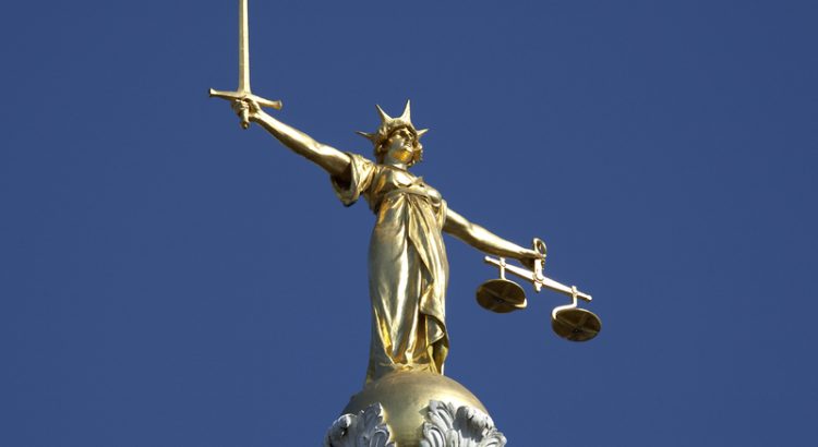 The statue of Justice atop the Old Bailey courthouse in London.